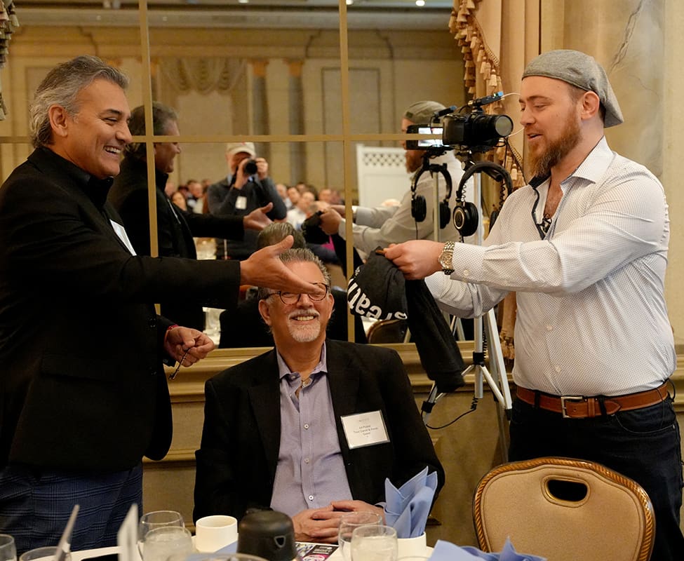 Ari Gunzburg Giving a Free T-Shirt