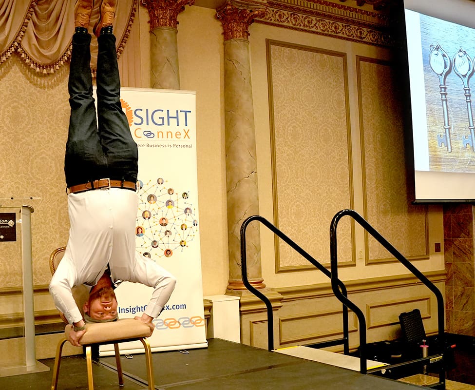 Ari Gunzburg Doing a Headstand